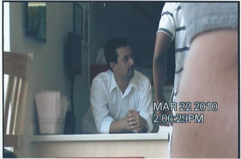 Hieu Nguyen working counter at his Lee's Sandwiches franchise.